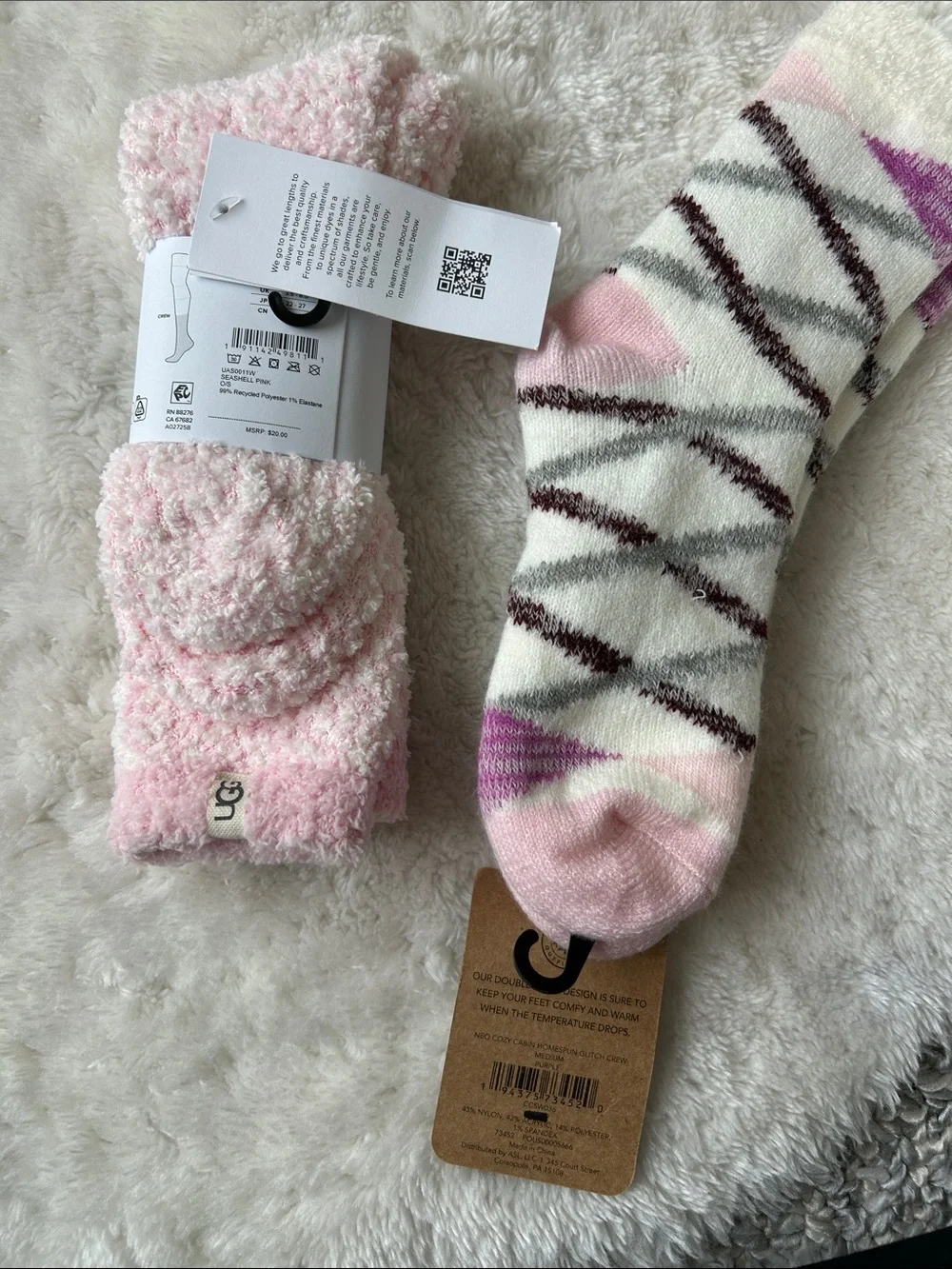 Pair of cozy socks: UGG Women's Light Pink Plush & Northeast Outfitters